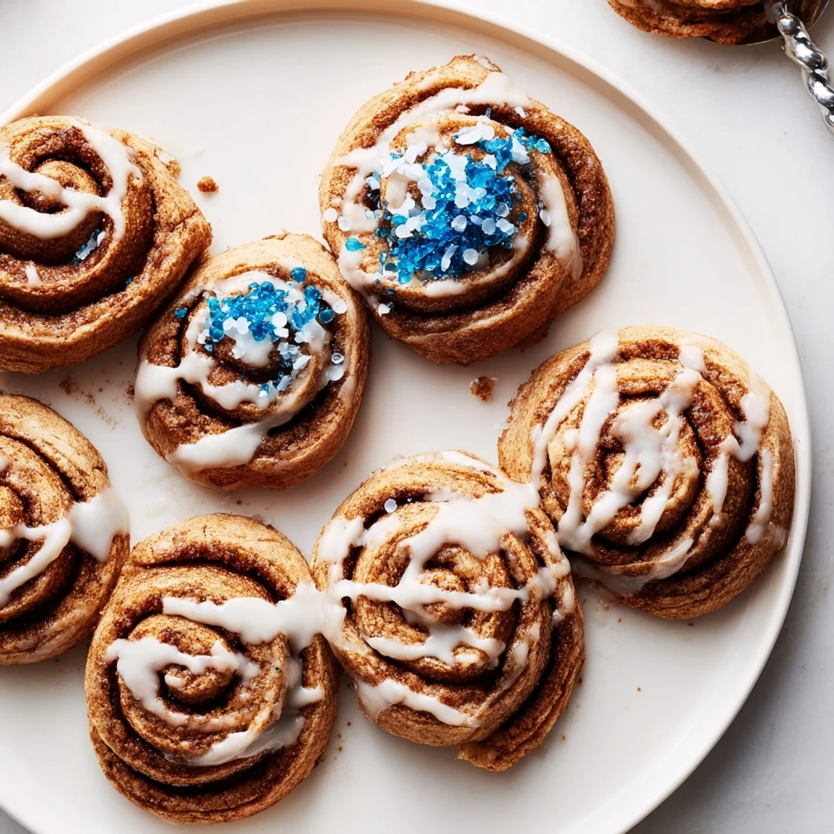 Festively spiced Gingerbread Hanukkah Cinnamon Roll Cookies ready to delight your holiday guests.  