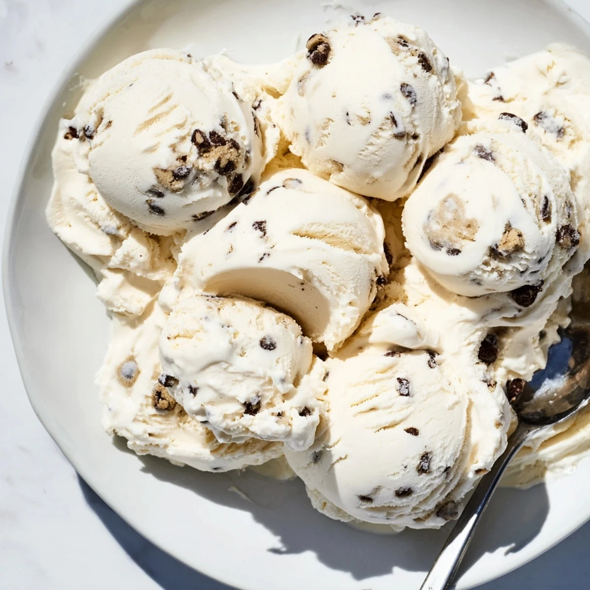 Creamy cottage cheese ice cream swirled with rich, edible cookie dough bites.  