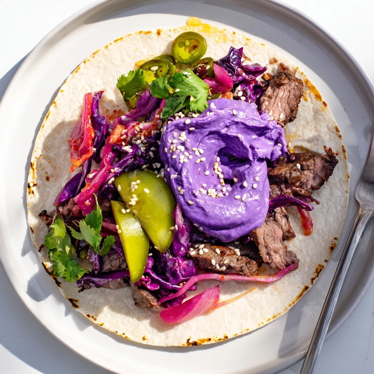 A delicious bowl of Global Street-Food Fusion Tacos featuring marinated protein and fresh veggies.