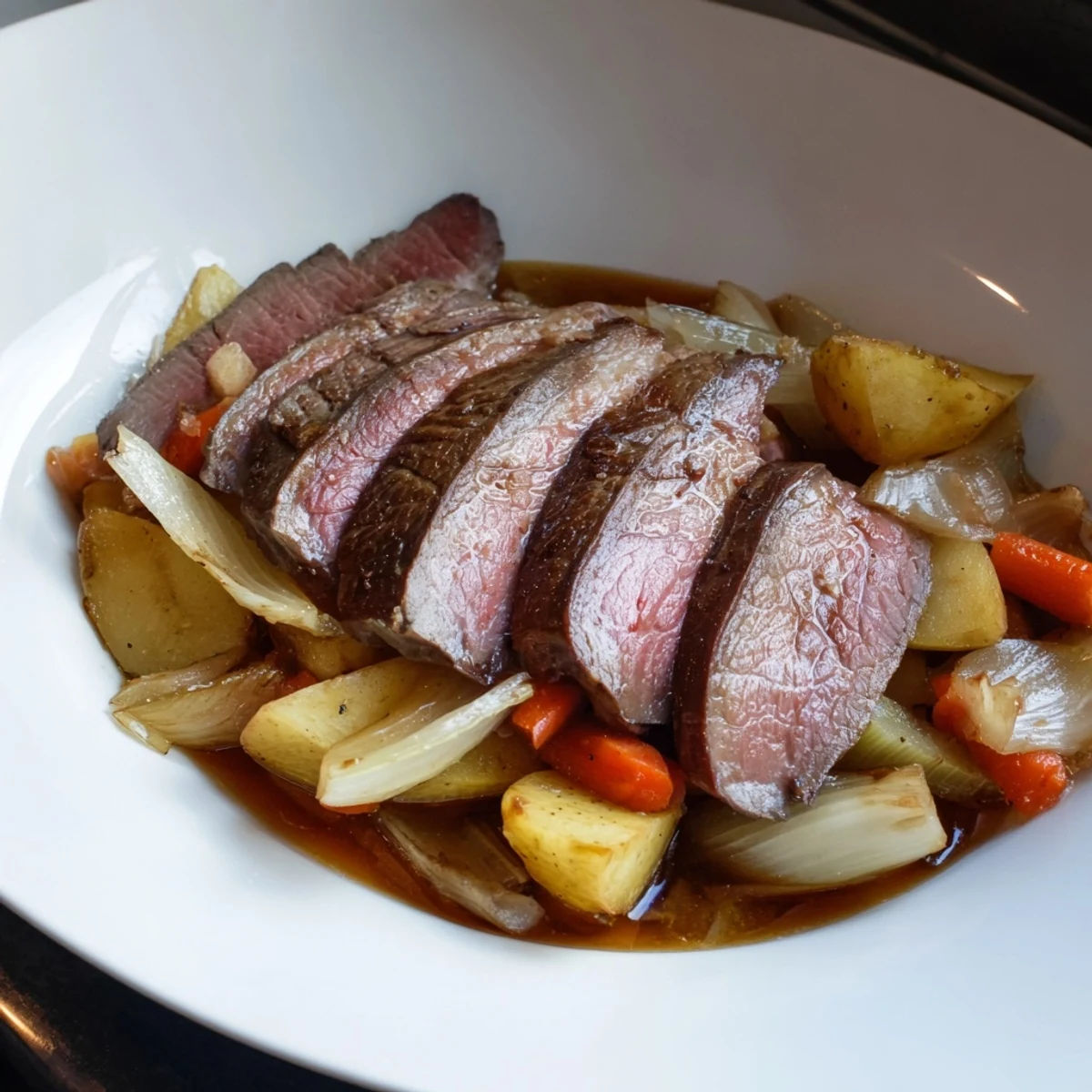 Golden-brown Sunday Pot Roast with tender beef and roasted vegetables, ready to serve and enjoy.