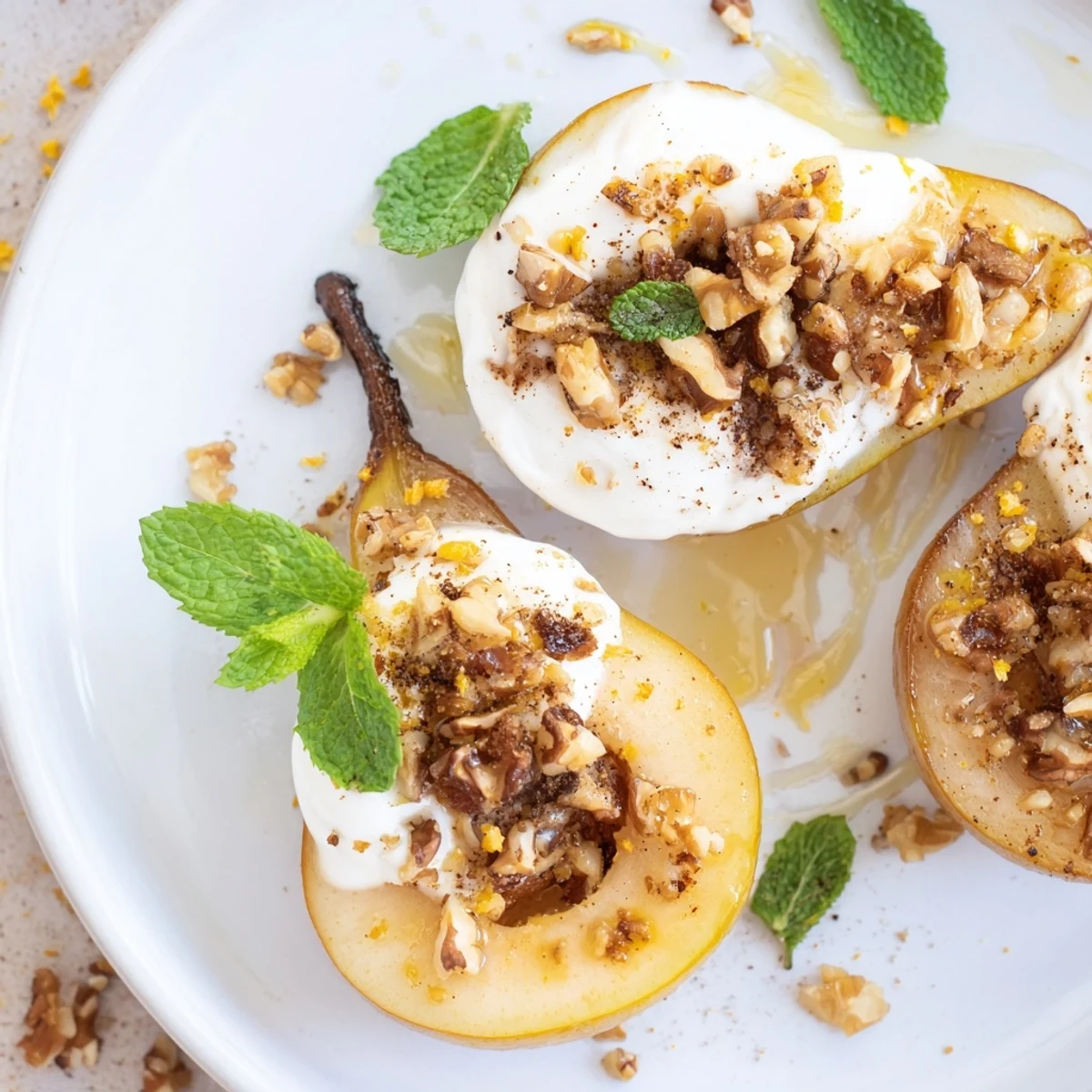 Image: A delightful serving of roasted pears with cinnamon, nuts, and yogurt drizzled with honey.