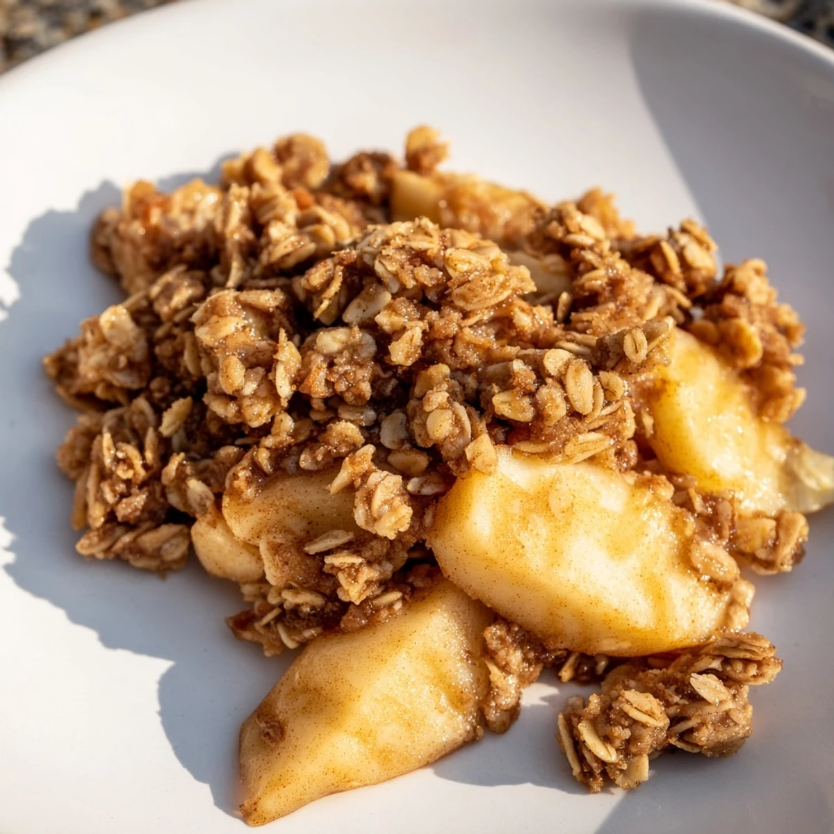 Homemade American Apple Crisp: A close-up view of the baked dessert, ready after baking for 40 minutes.