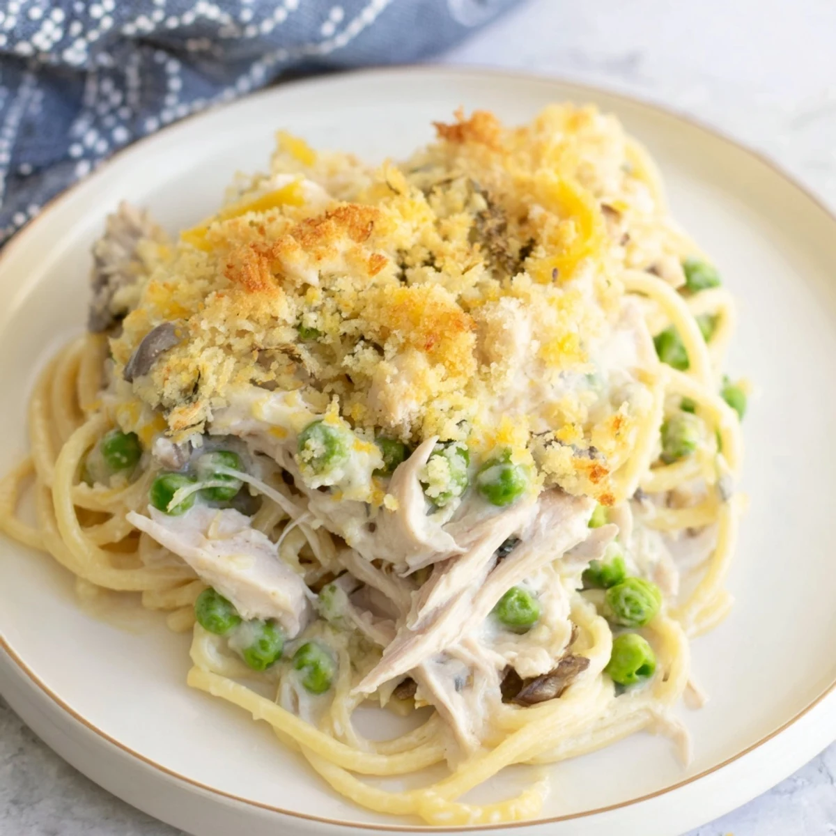 Warm, comforting image of a freshly baked Turkey or Chicken Tetrazzini, ready to serve and enjoy.
