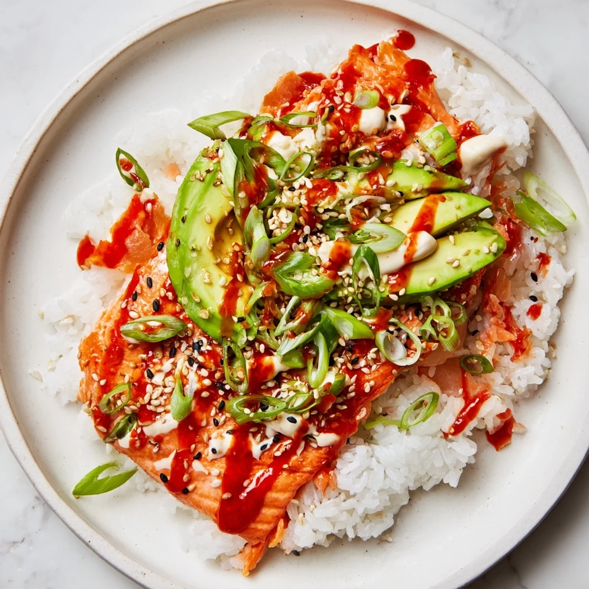 Flaky salmon sits atop seasoned rice in this comforting Classic Salmon Rice dish, ready to enjoy.