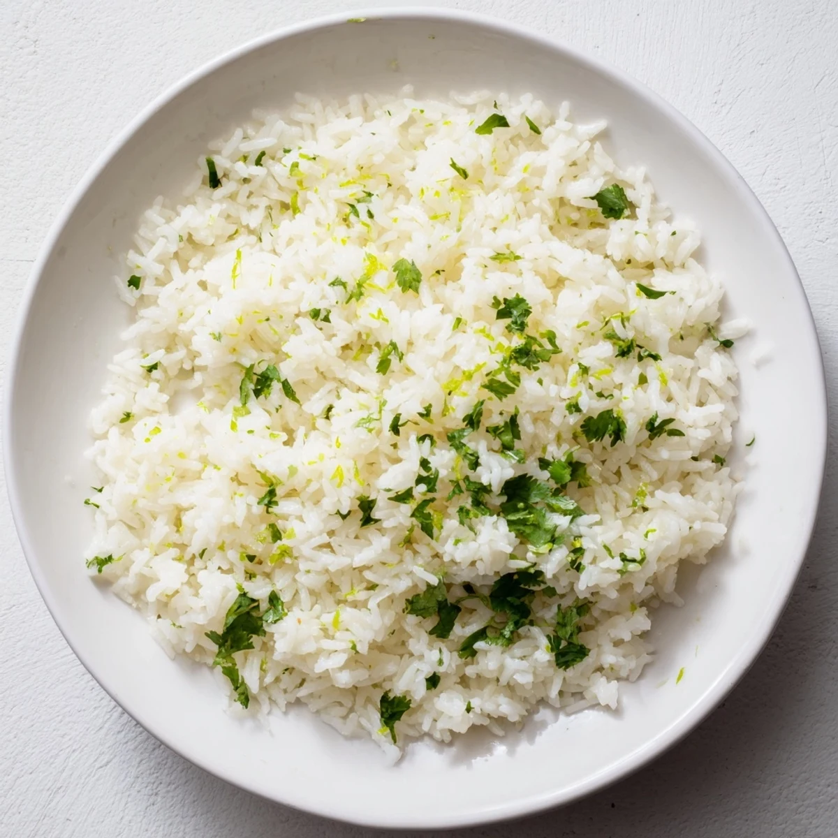 Bright green cilantro lime rice, a flavorful side dish, ready to be served.