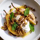 Sweet, tender roasted pears with cinnamon beautifully served atop creamy Greek yogurt and walnuts.