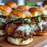 Stacked Father's Day bacon burger sliders, hot off the grill and ready to enjoy.