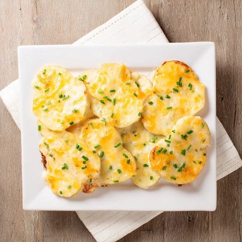 Golden, bubbly cheesy scalloped potatoes, a comforting Southern side, ready to serve and enjoy.