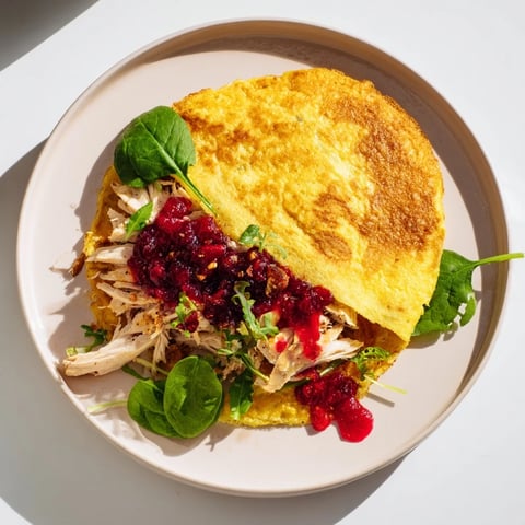 Moist Maker Chicken Wrap image shows a toasted tortilla filled with juicy chicken and savory gravy.