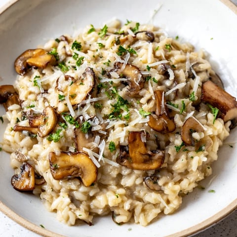 A creamy bowl of risotto with mushrooms, perfect for a cozy Italian dinner.