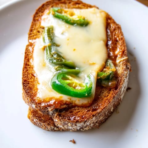 This vegetarian Jalapeño Havarti Grilled Cheese features melted cheese and fresh jalapeño slices between buttery sourdough.  