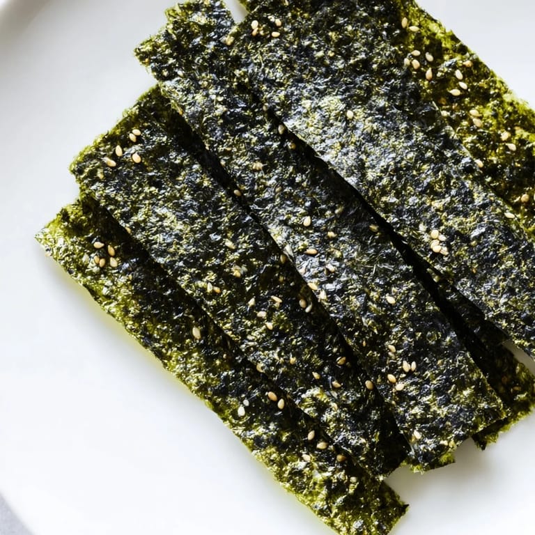 A delicious pile of freshly made Roasted Seaweed Chips, boasting a satisfying crunch and savory flavor.