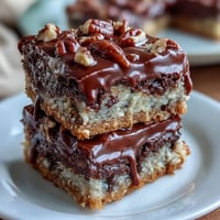 Decadent Kentucky Derby Chocolate Pecan Tart with rich chocolate filling and crunchy pecans in buttery crust, perfect for race day celebrations.